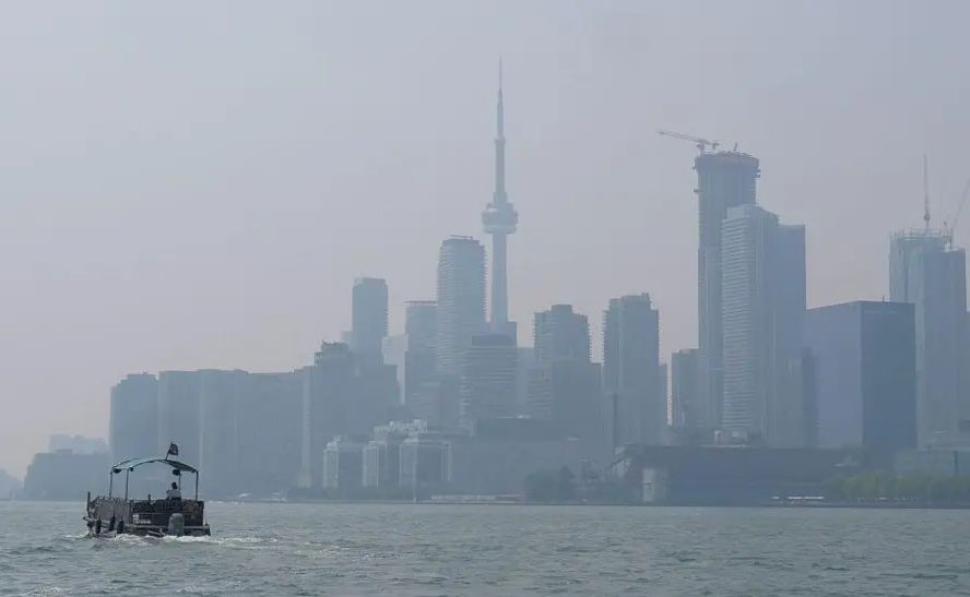 Smoke from the wildfires blanketed the Toronto skyline on Monday, where the air quality was among the lowest in the world [Getty Images]