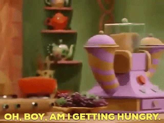 a cartoon character is talking about getting hungry in front of a purple teapot .