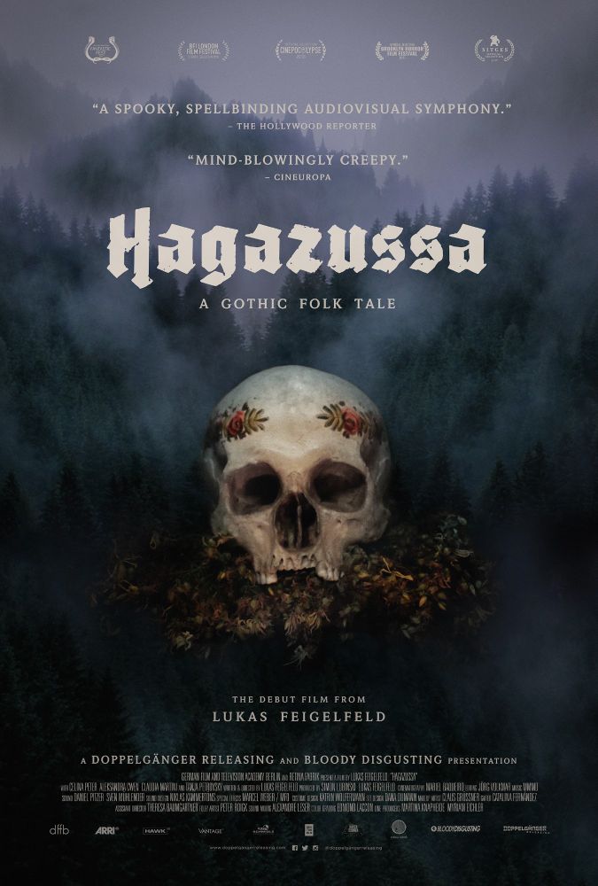 A movie poster for the film "Hagazussa" (2017)

The background is a mountainous forest covered in fog, and the foreground is a human skull with missing front teeth and a gold laurel