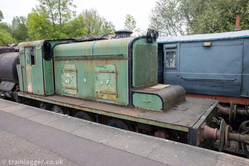 an green John Fowler -built locomotive is seen sitting in a platform