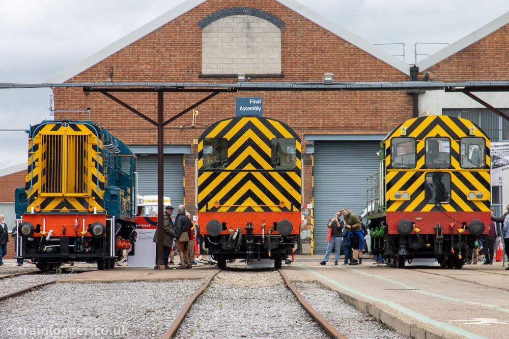 a line up of three class 08 shunters with their distinctive yellow and black "wasp stripe" ends
