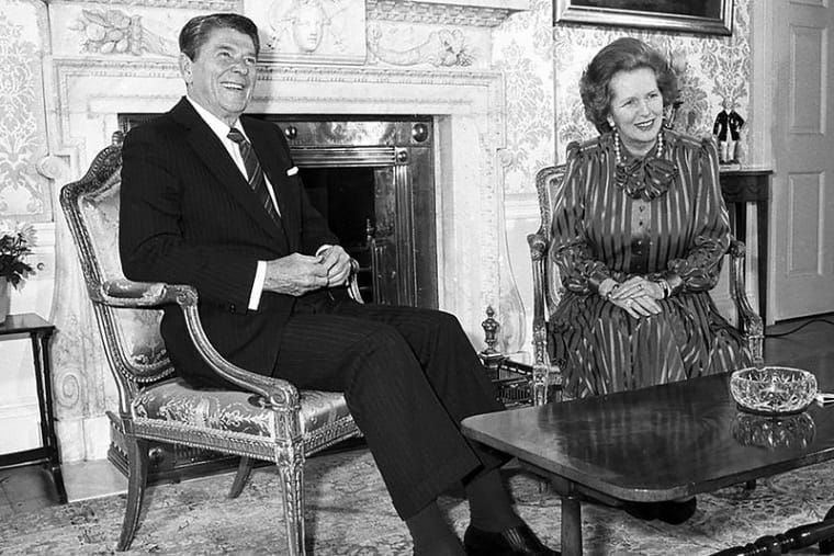 Vicious architects of neoliberalism, Ronald Regan and Margaret Thatcher in jovial mood