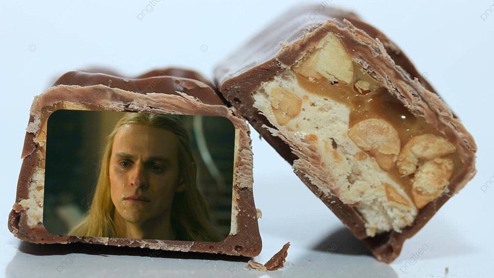 A candy bar cut in half with an image of Sauron crying pasted over one half. 
