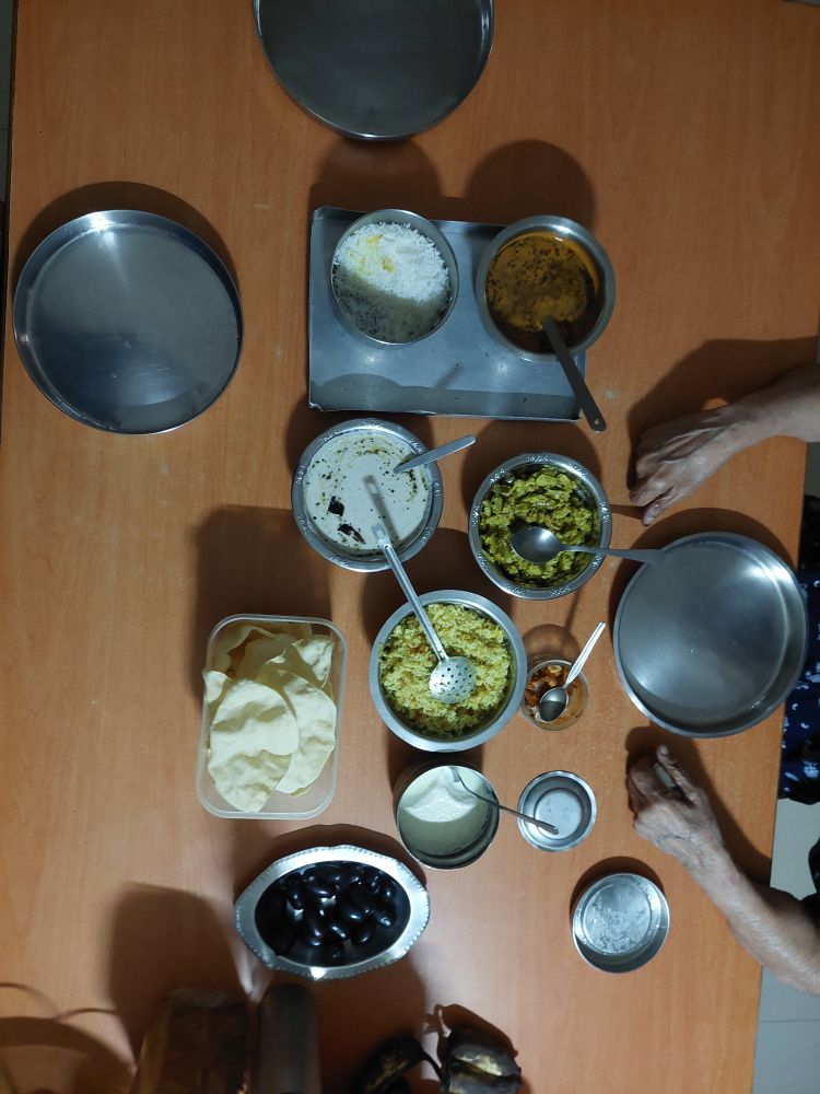 Chitranna, papad, jamun, mango pickle, rasam, palya, rice, raita, dahi. All made by my ammamma!