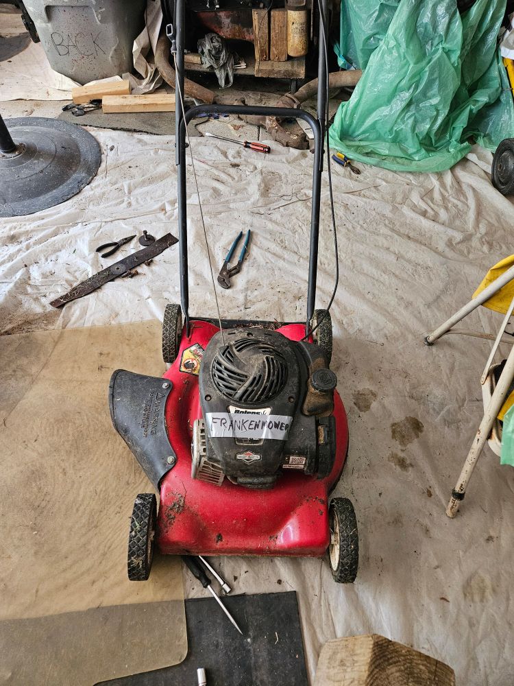 A mower deck that I switched the engine out on (bad engine on a good deck, and a good engine from a bad deck). I wrote Frankenmower on a piece of duct tape and stuck it in th engine.