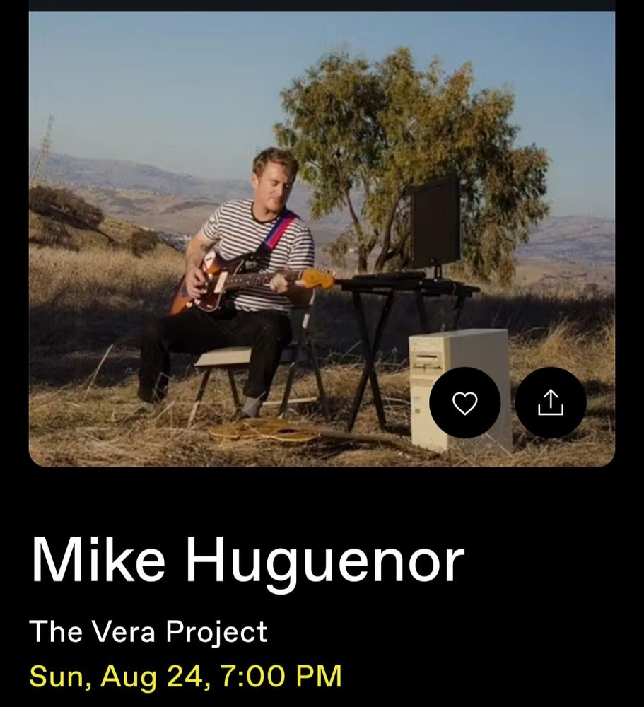Promo image for Mike Huguenor show in Seattle, featuring the musician performing in the San Jose hills alongside a desktop computer 