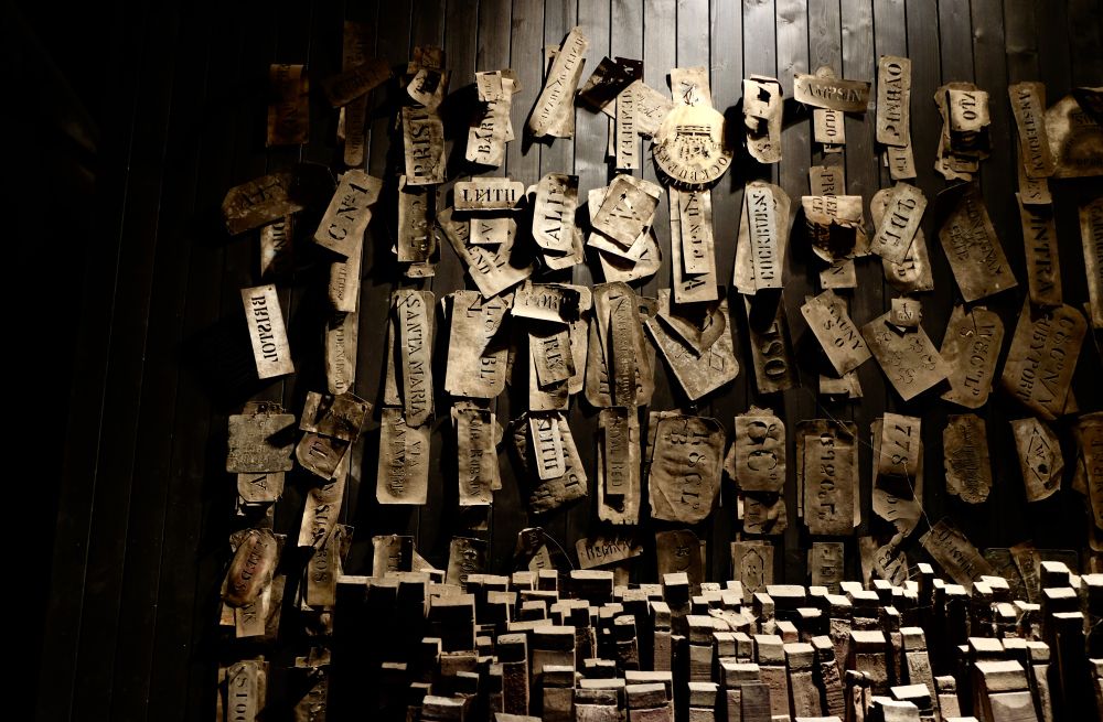 Barrel stencils on a wall in the workshop of Cockburn's port lodge in Vila Nova de Gaia, Portugal