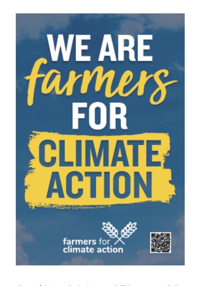 A farm gate sign that reads: we are farmers for climate action. 