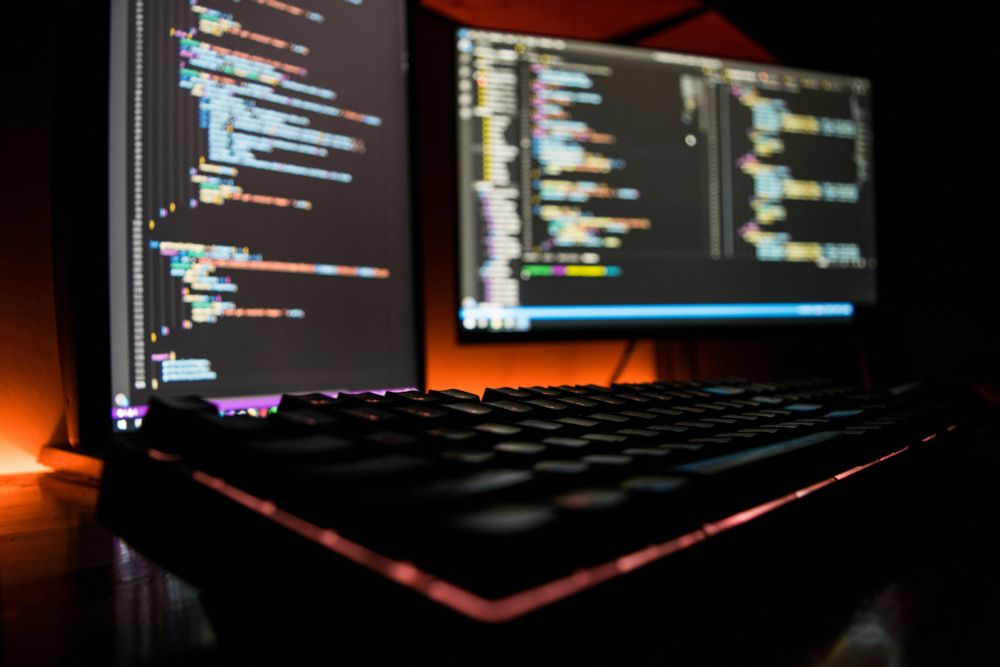Shot of programmers computer over the top of a keyboard looking at two monitors in a darkened office/desk. 

📚 QUANTUM FAX MACHINE: MARCH 2025 READING LIST! 🚀
⚡ Elixir 
Deep dive into the evolving Elixir ecosystem with highlights on Women in BEAM, new UI libraries for Phoenix LiveView, and Sean Moriarity's keynote on designing LLM-native systems with Elixir.
👉 https://quantumfaxmachine.com/blog/qfm058-elixir-reading-list-march-2025