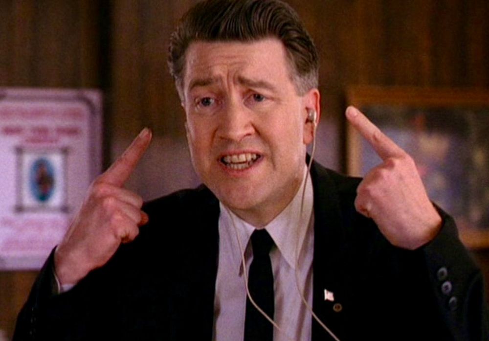 David Lynch as Gordon in Twin Peaks. Pointing at his hearing aids. 