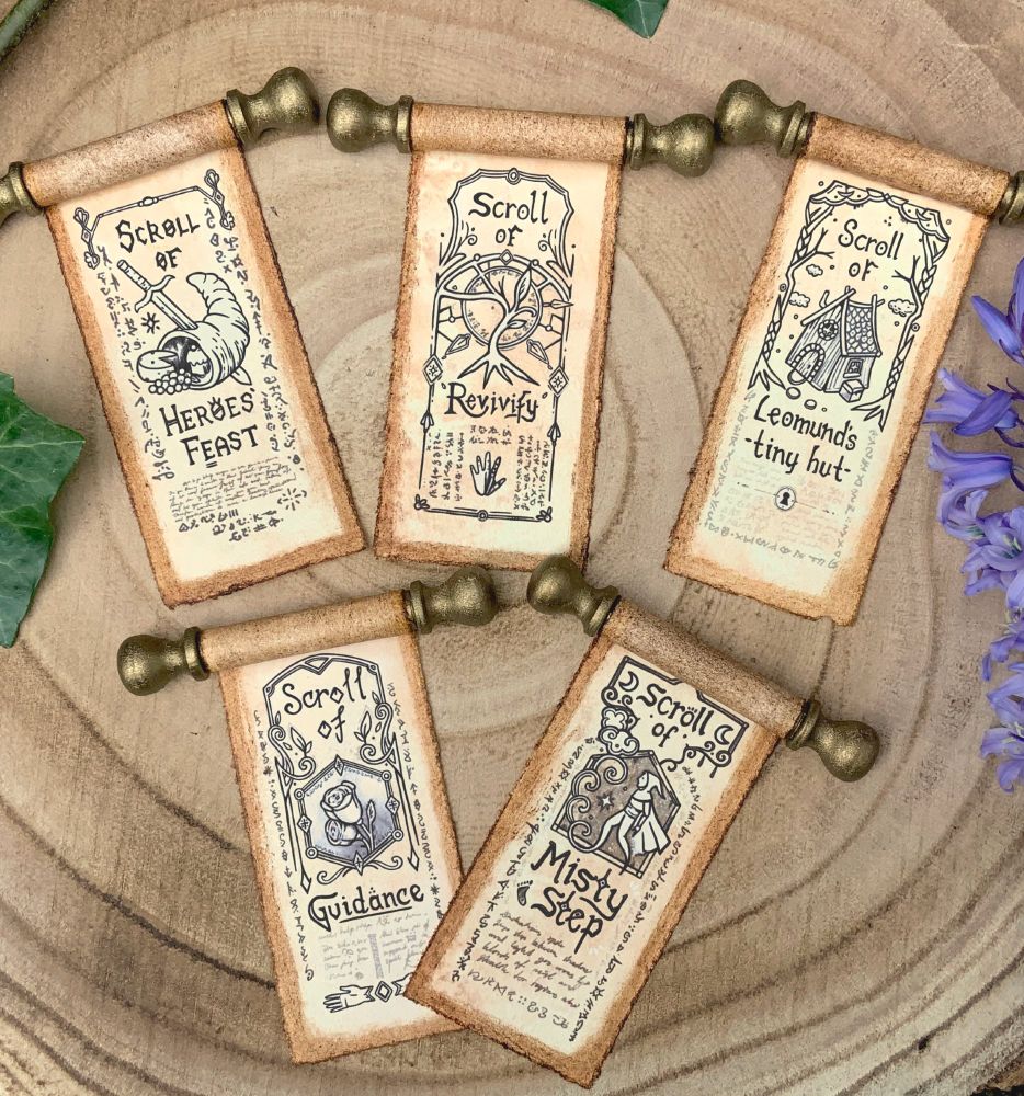 Mini scrolls pictured;
Heroes Feast
Revivify
Leomund's tiny hut
Guidance
Misty Step
