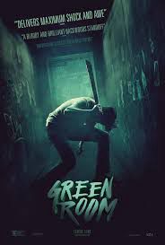 Poster for GREEN ROOM. A man-punk wielding a machete.