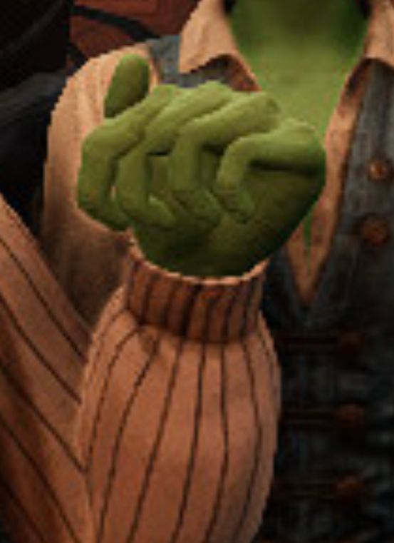 Closeup of a video game guy's fist, which looks like spinach noodles.  What on earth happened here