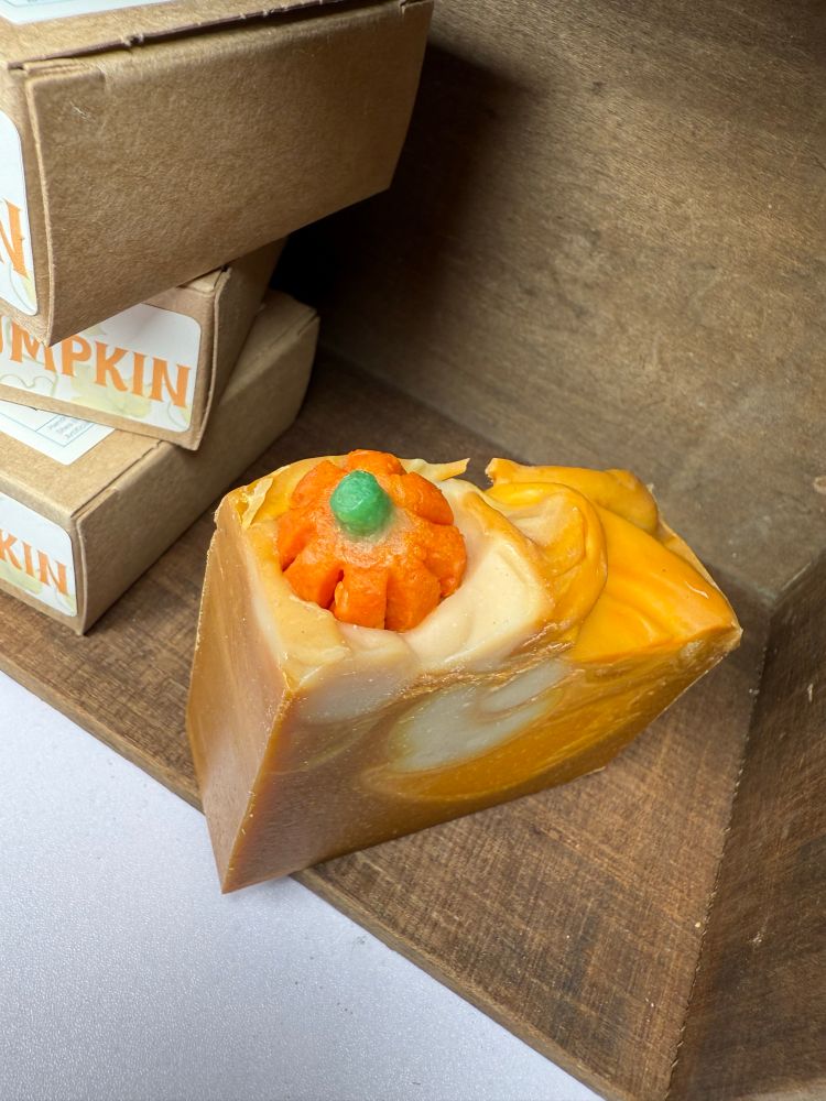 A pumpkin purée soap with a sculpted soap pumpkin on top