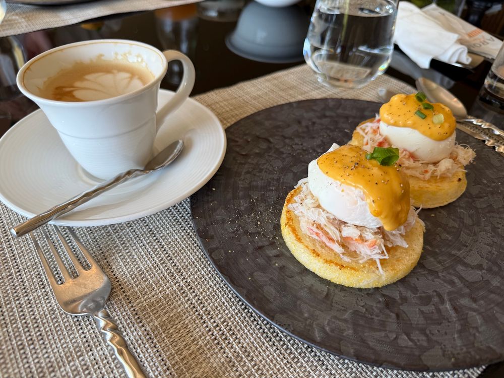snow crab benedict with flat white with oat milk 