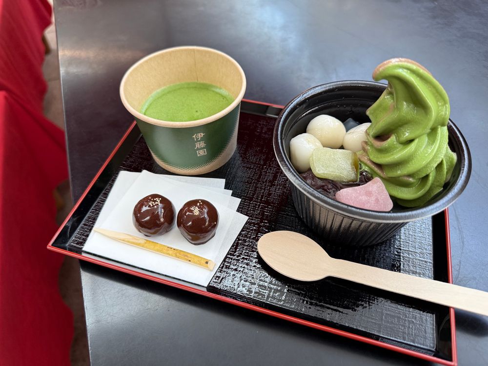matcha in a paper cup and matcha and hōjicha mix soft serve with shiratama mochi balls 