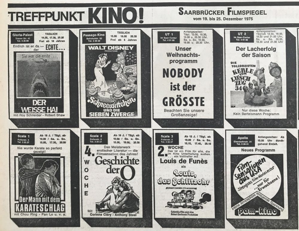 Eine alte Kino-Anzeige von 1975 mit "Der weiße Hai", Terence Hill und Walt Disney.