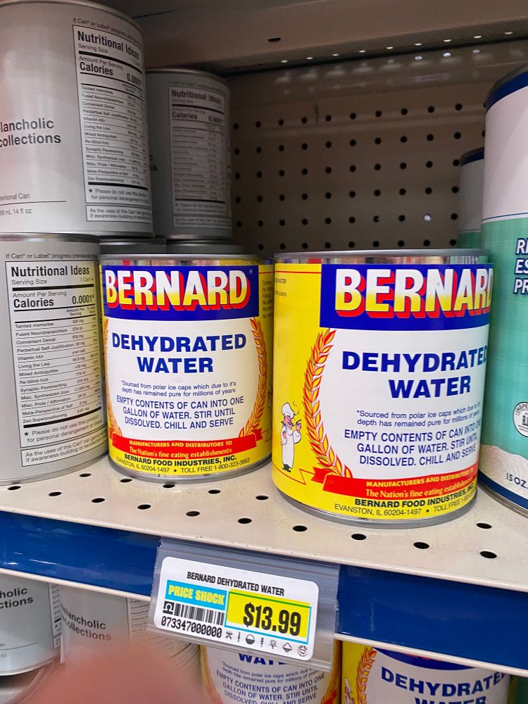 An image of “Bernard’s Dehydrated Water” a fake product on the shelf of omega mart. 