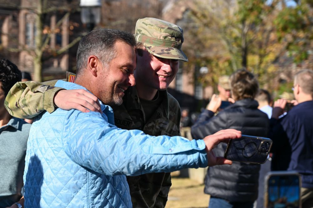 a selfie with an ROTC student and family member