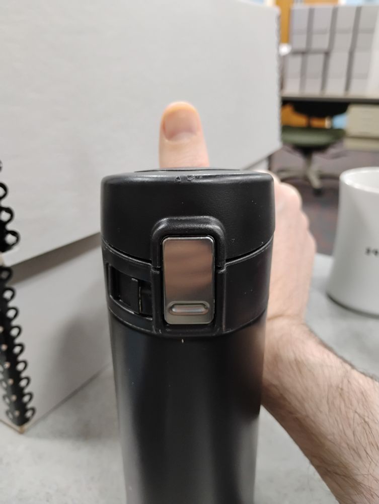 My thumb in its Halloween costume. The costume is "disgraced children's author"