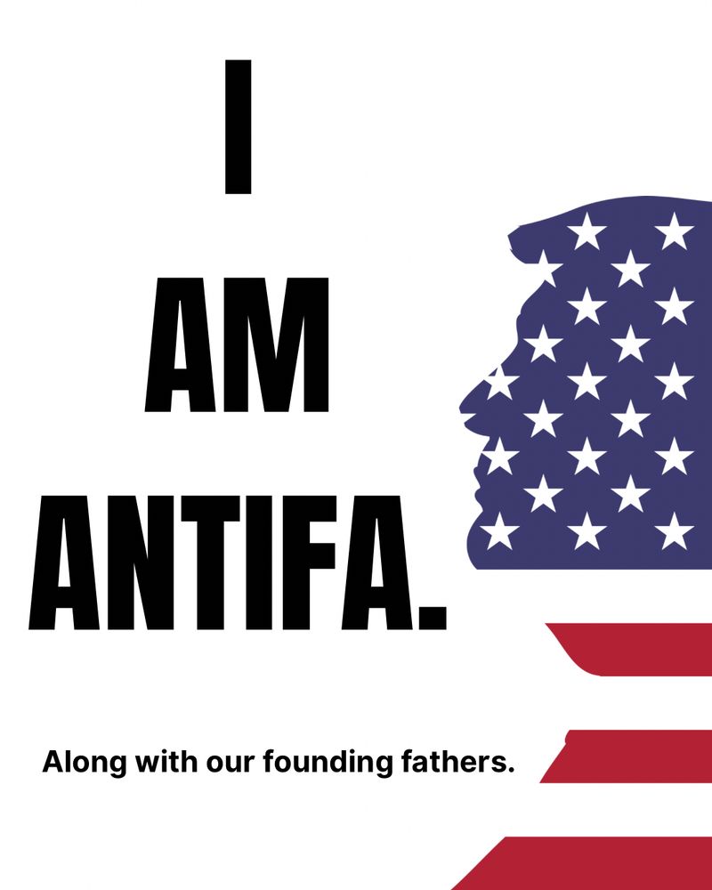 Text reads “I AM ANTIFA.” followed by “Along with our founding fathers.” To the right, there is a silhouette of a Donald Trump’s head filled with the pattern of the U.S. flag — blue field with white stars and red stripes. The background is white.