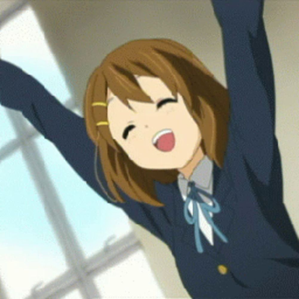 a girl with her arms outstretched is smiling