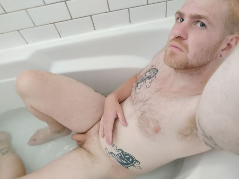 Bath selfie. Im naked and wet. Piercings n tattoos. Pubes and body hair