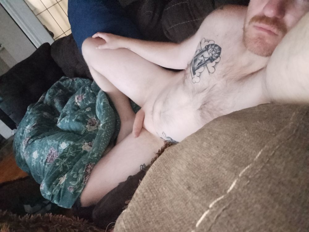 Lying on the couch nakey