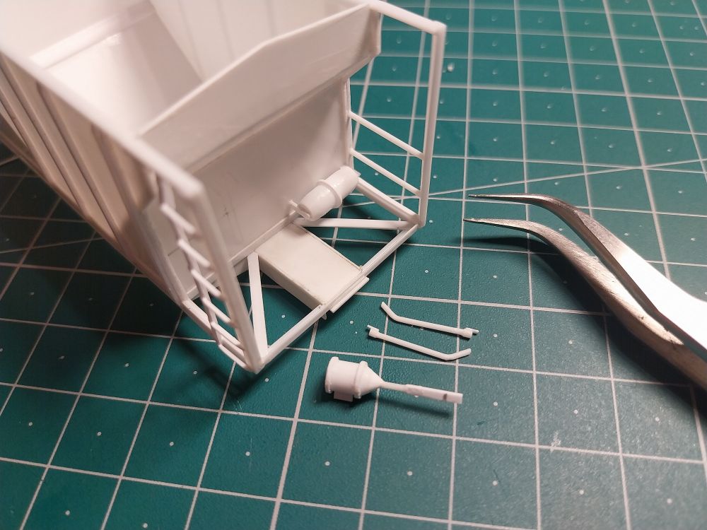 Scratchbuilt styrene end details for ballast hopper.