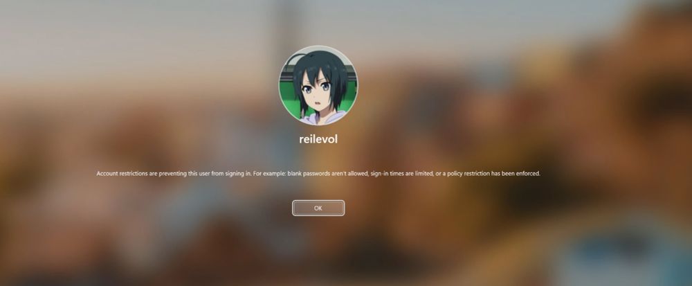 a windows logon screen saying "account restrictions are preventing this user from signing in"