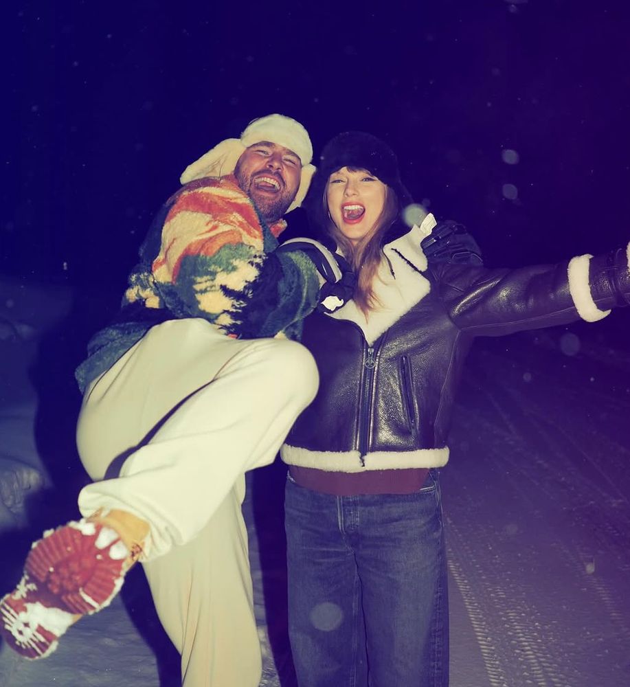 Travis Kelce and Taylor Swift posing together and being silly and goofy. 