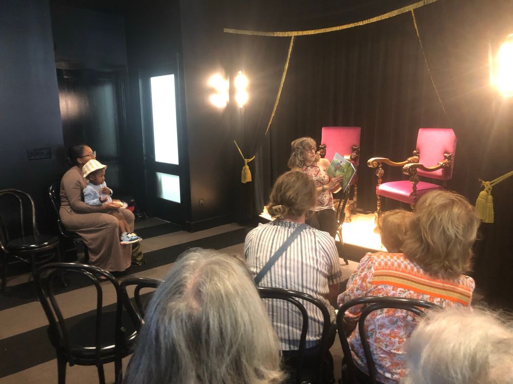 Gail reading to audience