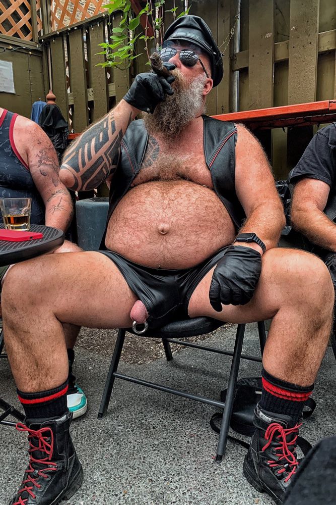 Dad smoking a cigar with his dick poking out 