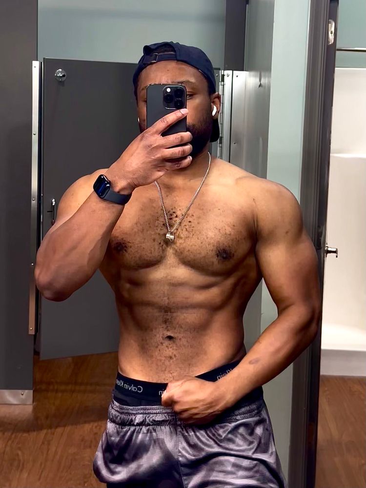 Mirror selfie pic showing of my shirtless upper body pump in the gym bathroom