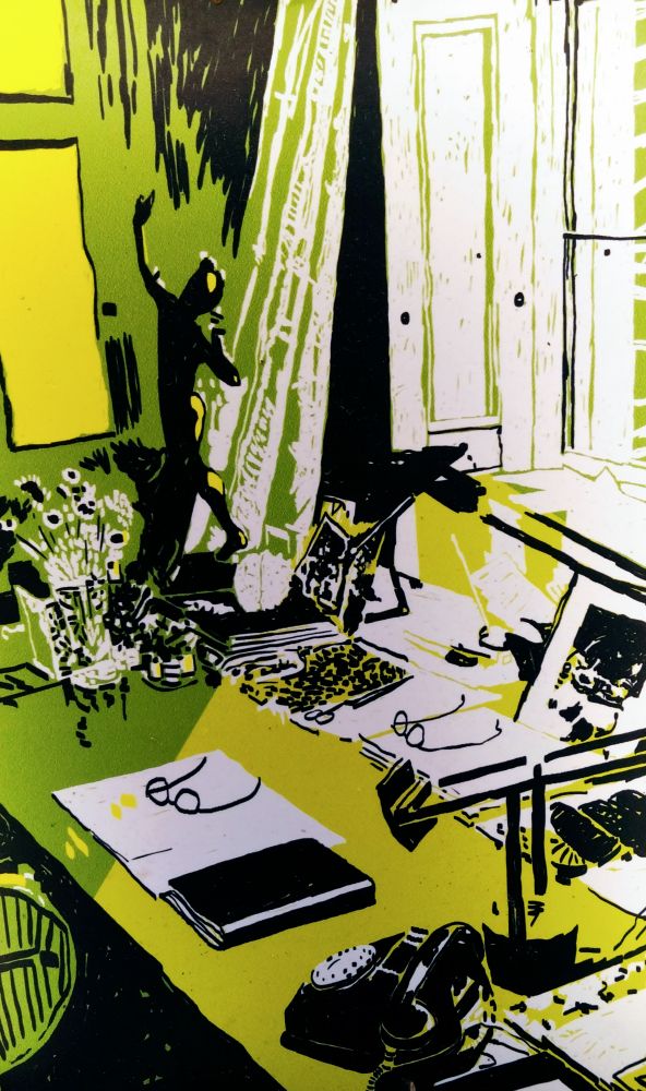 Desk with writing materials.
