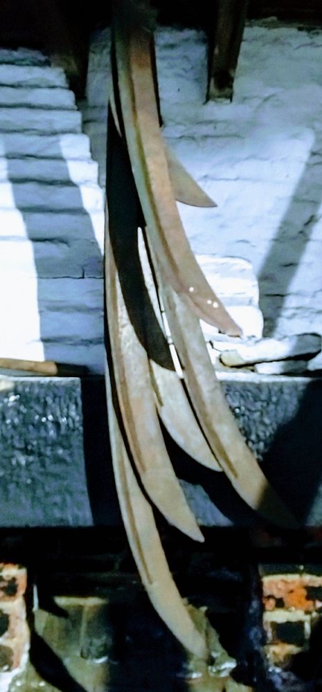 A bunch of steel scythes. 