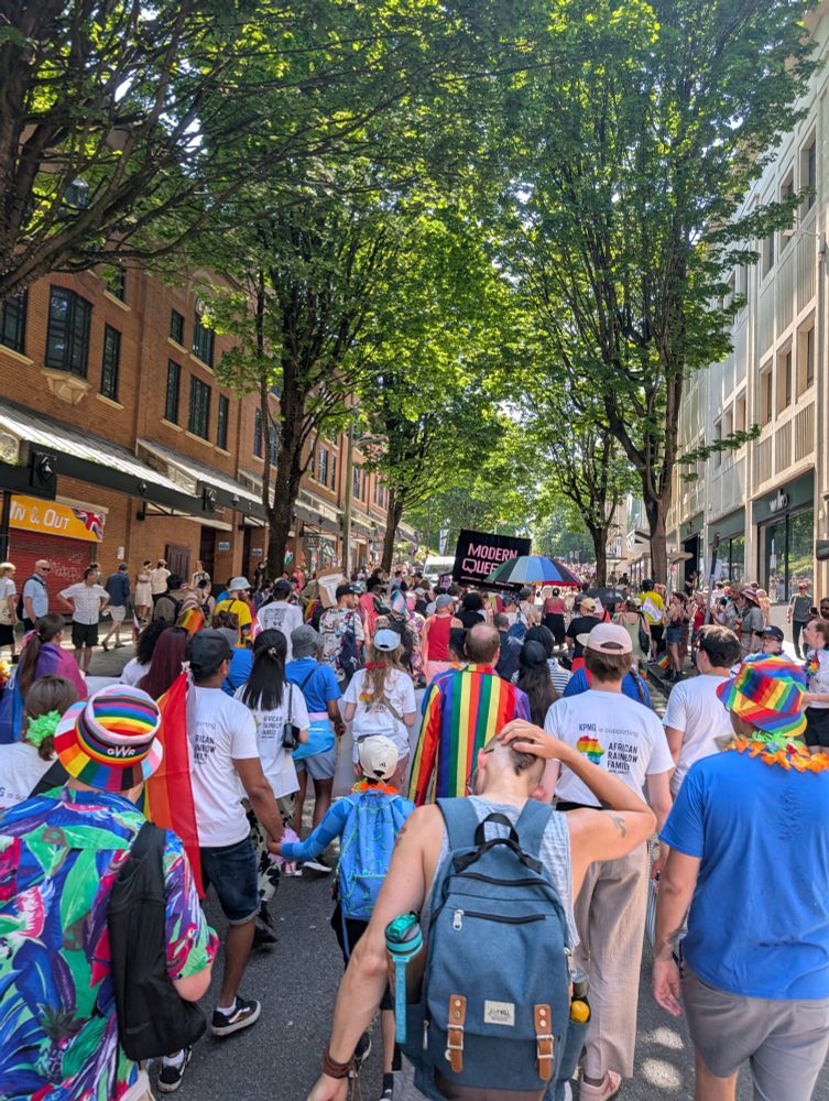 Colourful sea of people as part of Bristol Pride 2025 march
