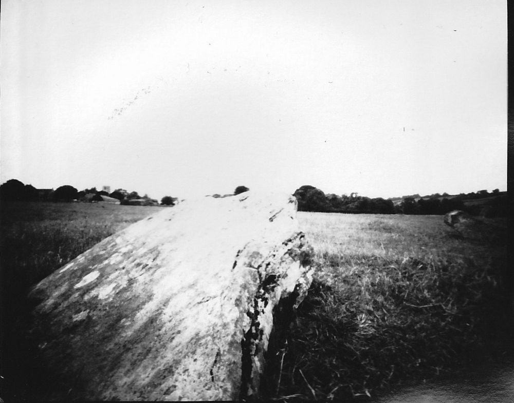 Black and white Pinhole photograph of standing stone at Stanton Drew