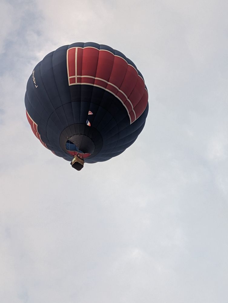 A single hot air balloon in the sky