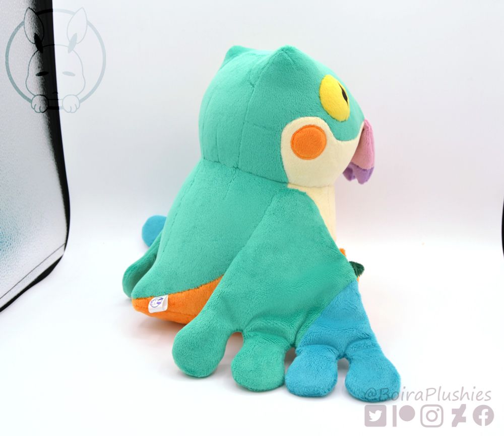 Handmade plush of a baby Pukei Pukei from Monster Hunter