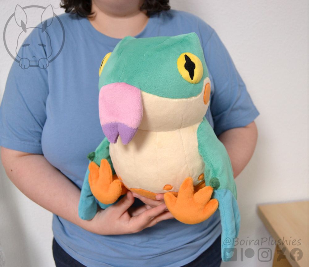 Handmade plush of a baby Pukei Pukei from Monster Hunter