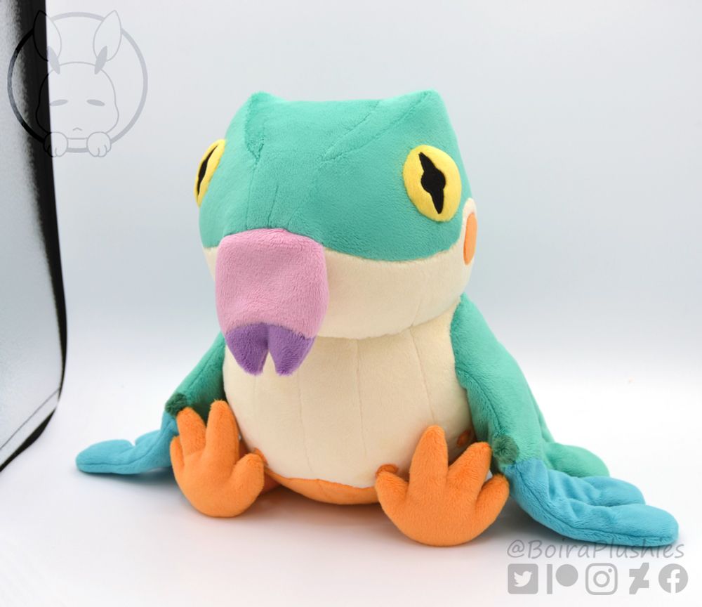 Handmade plush of a baby Pukei Pukei from Monster Hunter