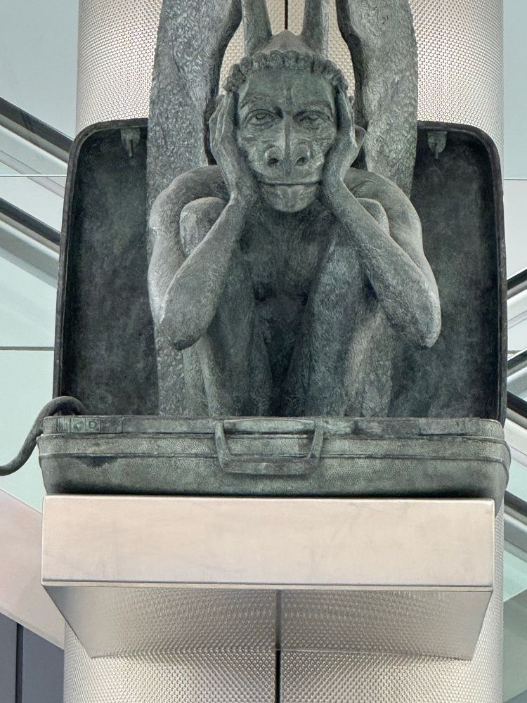 A gargoyle at baggage claim in Denver airport 