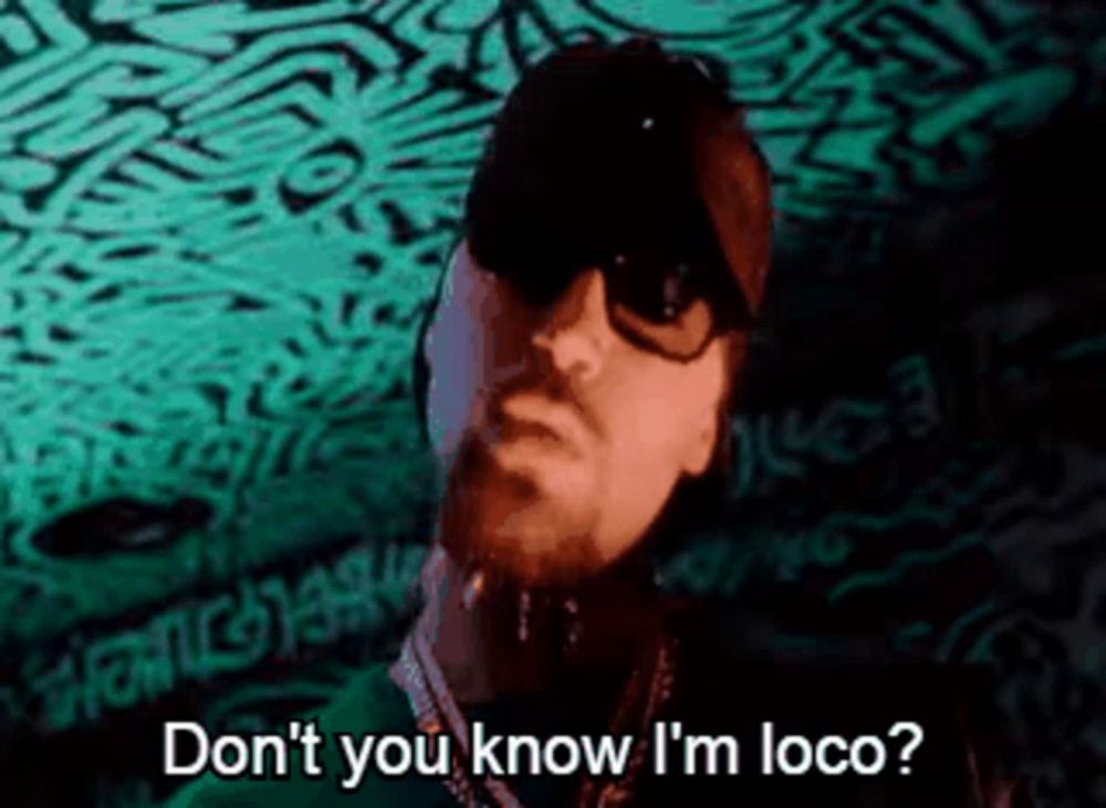 a man is wearing sunglasses and a hat and says `` don 't you know i 'm loco '' .