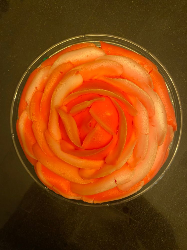 A cake decorated like a rose 
