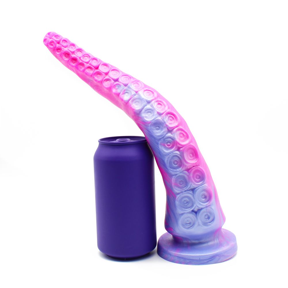 The same tentacle dildo standing on its flared base, leaning over on a soda pop can for scale/comparison.