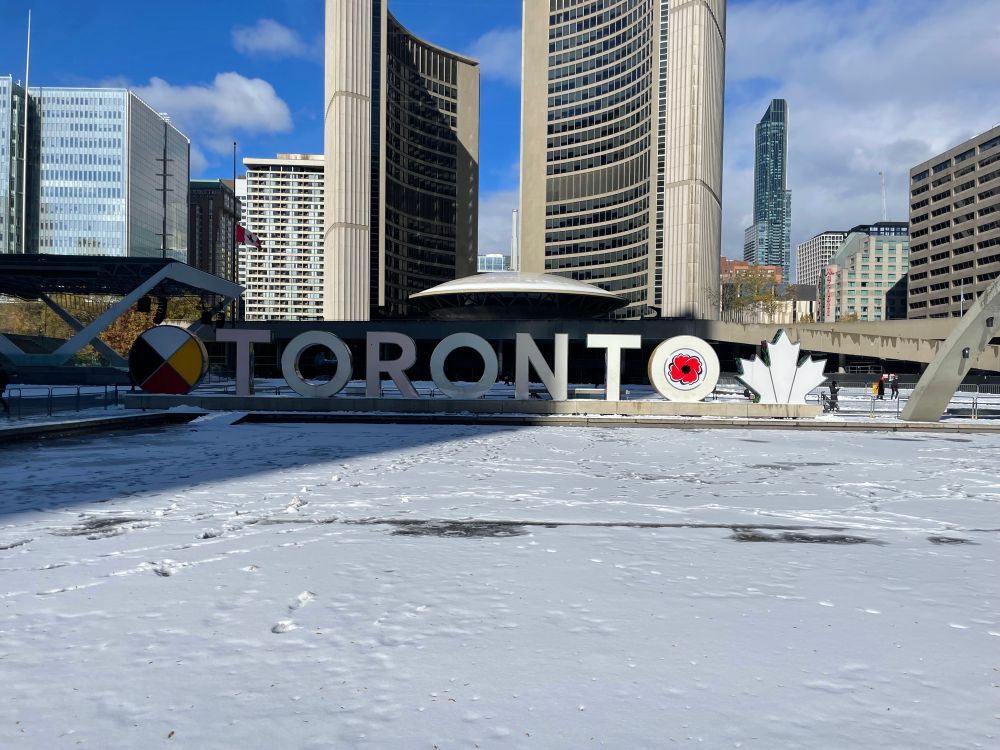 Toronto with a poppy on the last o. 
