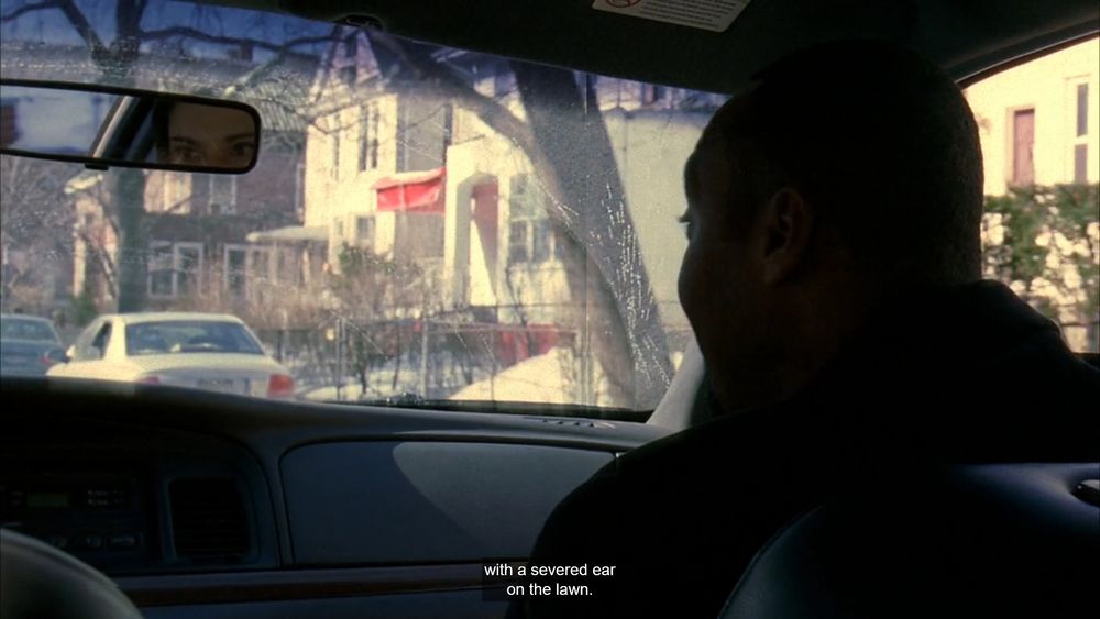 Detective Green: with a severed ear on the lawn.