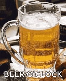 A big glass of beer with "Beer o'clock" as subtitle