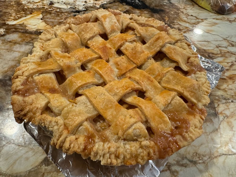 Peach pie with a lattice top.
